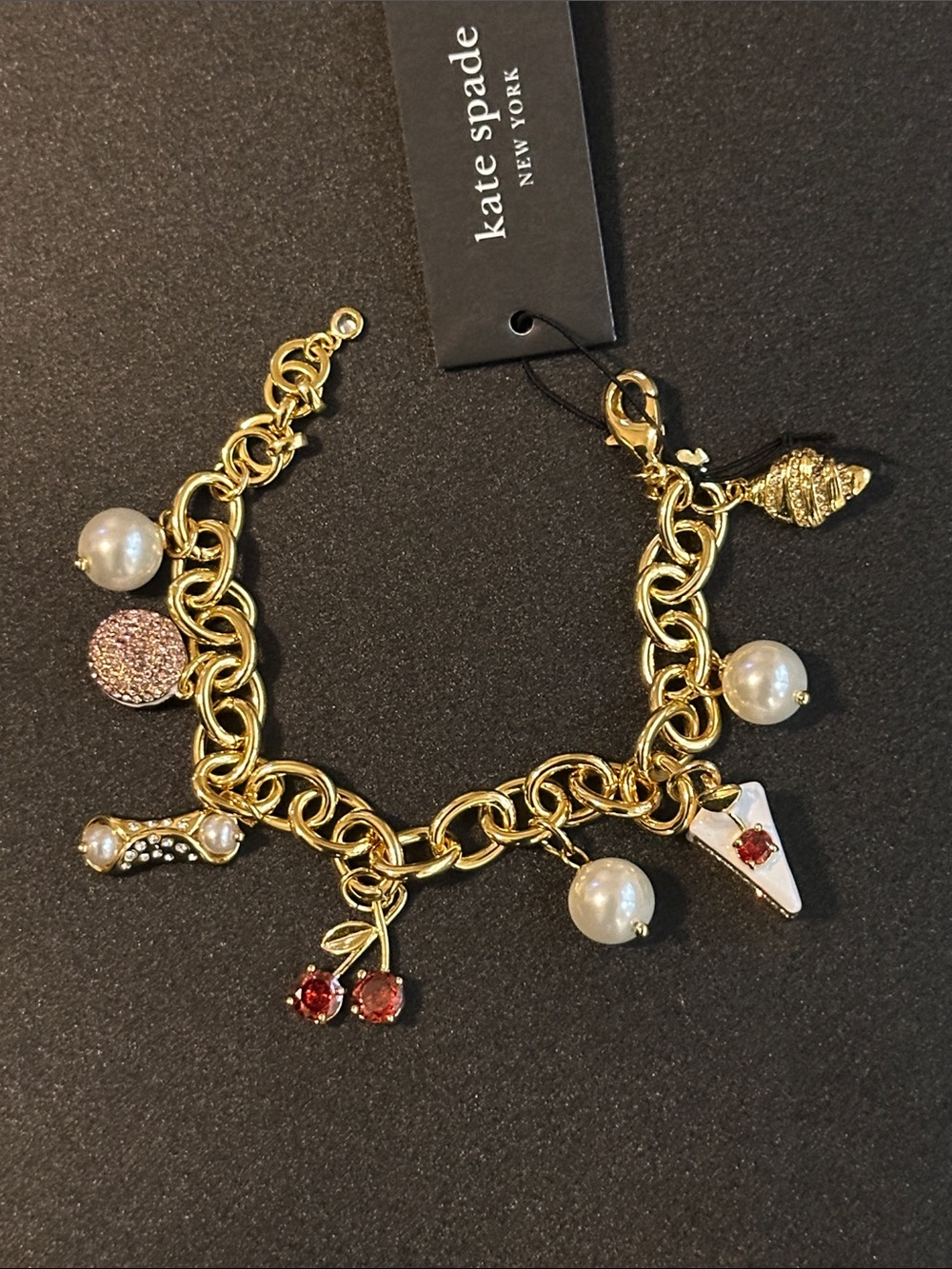 Kate Spade New York Gold-Tone Charm Bracelet with Faux Pearls & Whimsical Charms - Picture 3 of 3